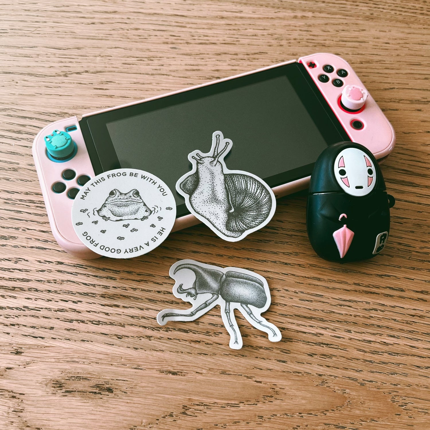 snail and rhino beetle sticker