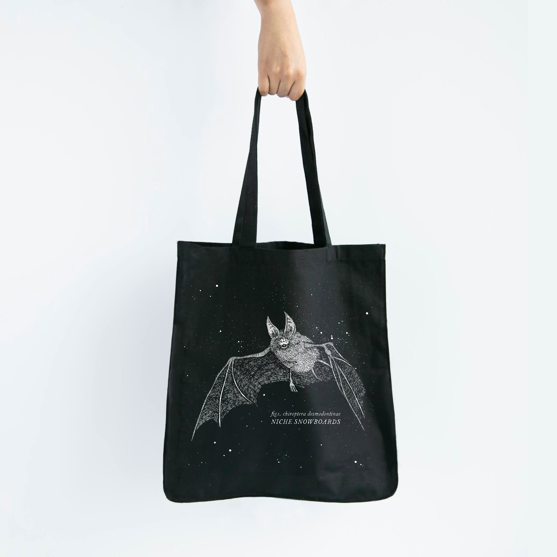 niche snowboards bat tote bag
